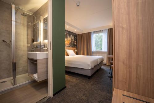 Imagen de la habitación del Hotel Fletcher Restaurant Rooland. Foto 19