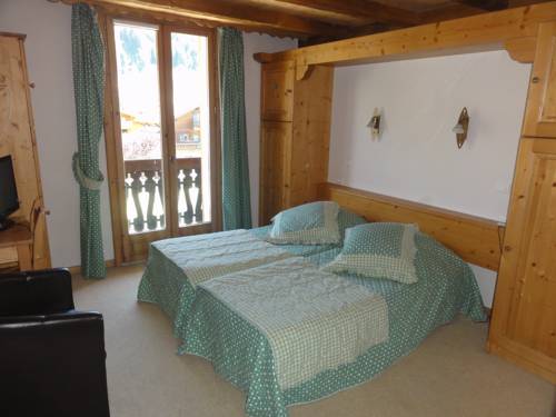 Imagen de la habitación del Hotel Fleur Des Neiges. Foto 10