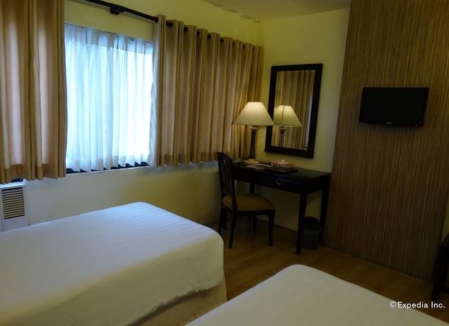 Imagen de la habitación del Hotel Fleuris Palawan. Foto 6