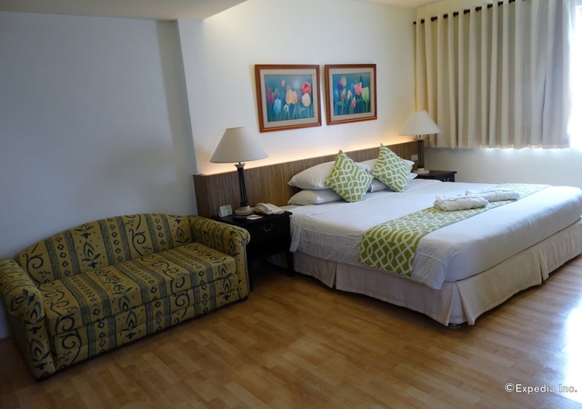 Imagen de la habitación del Hotel Fleuris Palawan. Foto 11