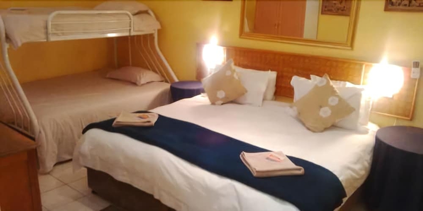 Imagen de la habitación del Hotel Flintstones Guest House Durban. Foto 7