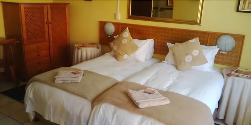 Imagen de la habitación del Hotel Flintstones Guest House Durban. Foto 8