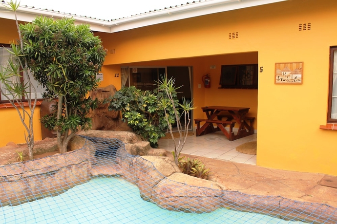 Imagen de la habitación del Hotel Flintstones Guest House Durban. Foto 11