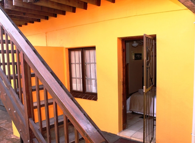 Imagen de la habitación del Hotel Flintstones Guest House Durban. Foto 12