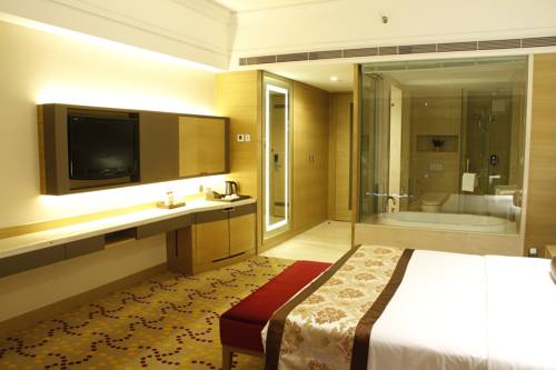 Imagen de la habitación del Hotel Fliport Jinjiang Shiji. Foto 5