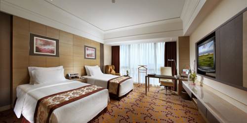 Imagen de la habitación del Hotel Fliport Jinjiang Shiji. Foto 7