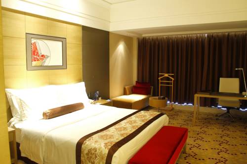 Imagen de la habitación del Hotel Fliport Jinjiang Shiji. Foto 8
