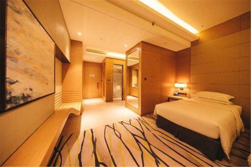 Imagen de la habitación del Hotel Fliport Wutong. Foto 8