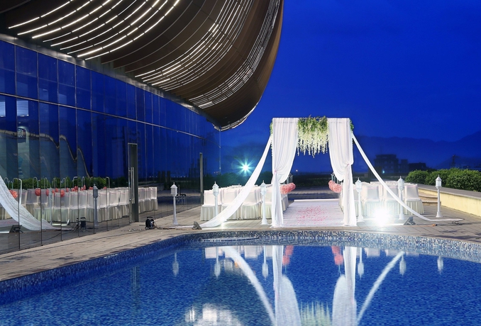Imagen de la piscina del Hotel Fliport Zhangzhou Yuanshan. Foto 19