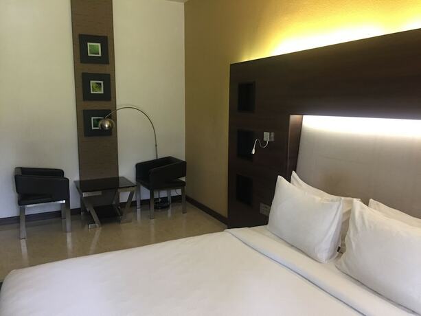 Imagen de la habitación del Hotel Flora Airport and Convention Centre Kochi. Foto 14