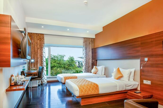 Imagen de la habitación del Hotel Flora Airport and Convention Centre Kochi. Foto 15