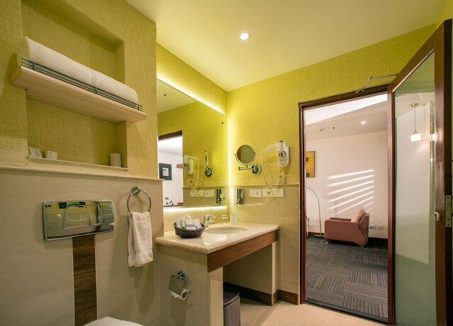 Imagen de la habitación del Hotel Flora Airport and Convention Centre Kochi. Foto 22
