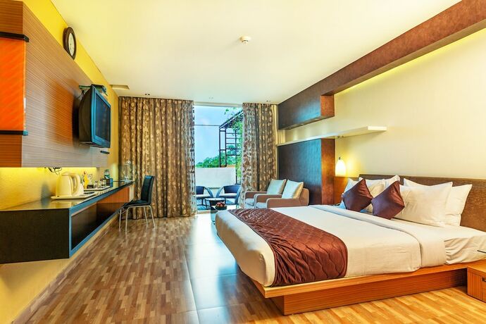 Imagen de la habitación del Hotel Flora Airport and Convention Centre Kochi. Foto 26