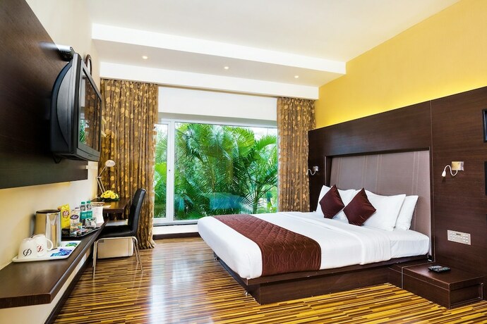 Imagen de la habitación del Hotel Flora Airport and Convention Centre Kochi. Foto 30