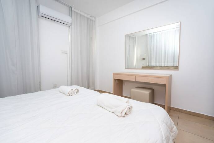 Imagen de la habitación del Hotel Flora Apartments. Foto 5