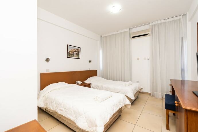 Imagen de la habitación del Hotel Flora Apartments. Foto 6