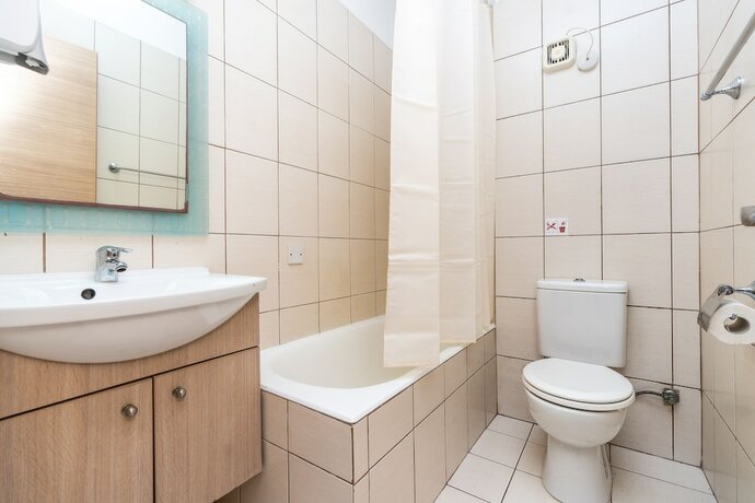 Imagen de la habitación del Hotel Flora Apartments. Foto 8