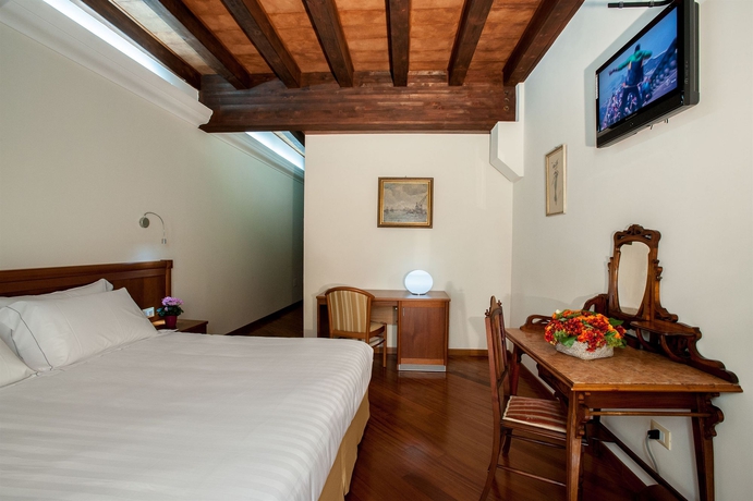 Imagen de la habitación del Hotel Flora, CAGLIARI. Foto 5