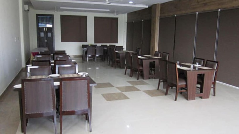 Imagen del bar/restaurante del Hotel Flora Haridwar. Foto 3