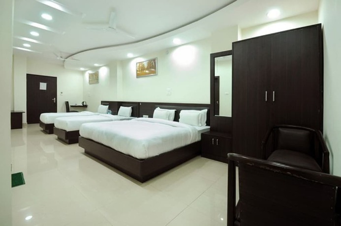 Imagen de la habitación del Hotel Flora Haridwar. Foto 6