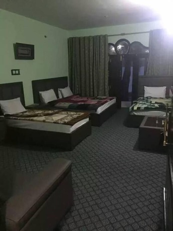Imagen de la habitación del Hotel Flora Inn Naran. Foto 18