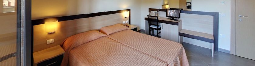 Imagen de la habitación del Hotel Flora, Marina di Bibbona. Foto 3