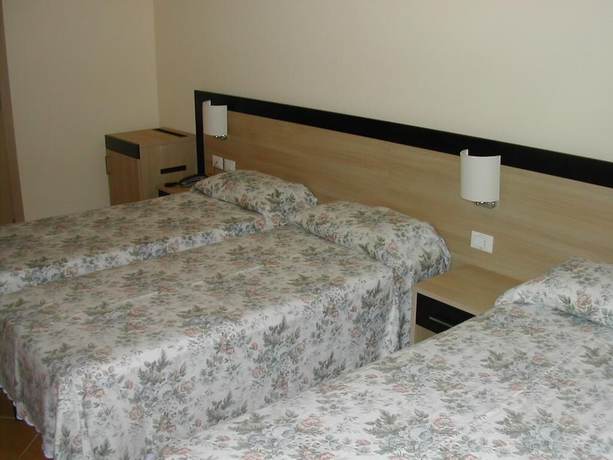 Imagen de la habitación del Hotel Flora, Marina di Bibbona. Foto 7