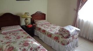 Imagen de la habitación del Hotel Flora Park Apartment. Foto 3