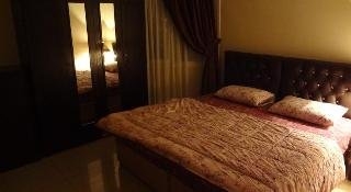 Imagen de la habitación del Hotel Flora Park Apartment. Foto 7