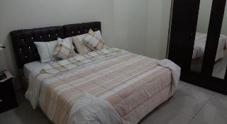 Imagen de la habitación del Hotel Flora Park Apartment. Foto 10