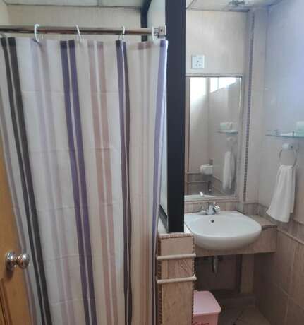 Imagen de la habitación del Hotel Flora Place. Foto 18