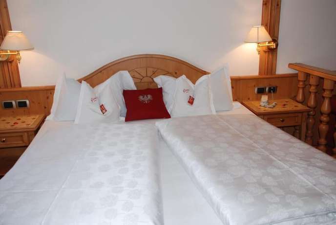 Imagen de la habitación del Hotel Flora, Selva di Val Gardena. Foto 3