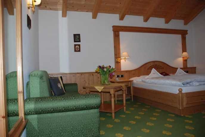 Imagen de la habitación del Hotel Flora, Selva di Val Gardena. Foto 4