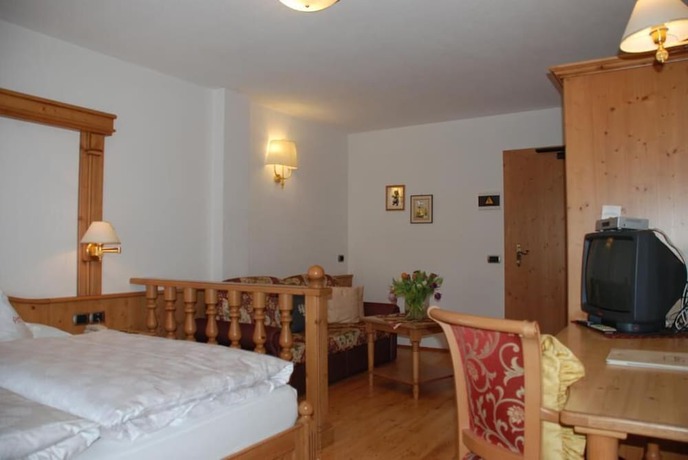 Imagen de la habitación del Hotel Flora, Selva di Val Gardena. Foto 5
