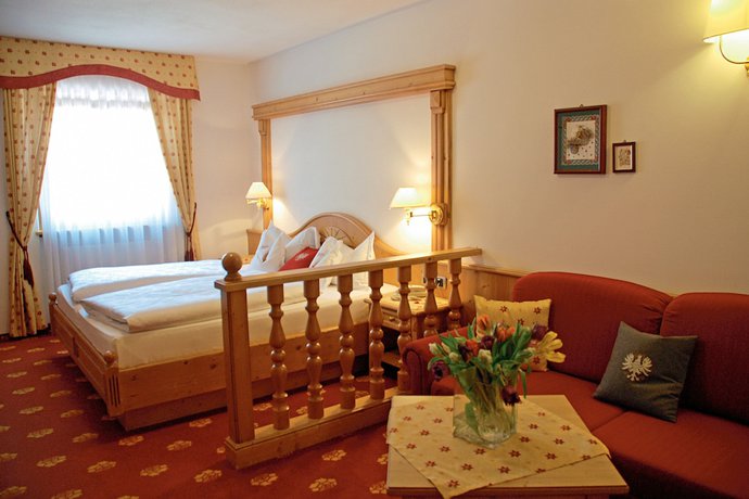 Imagen de la habitación del Hotel Flora, Selva di Val Gardena. Foto 7