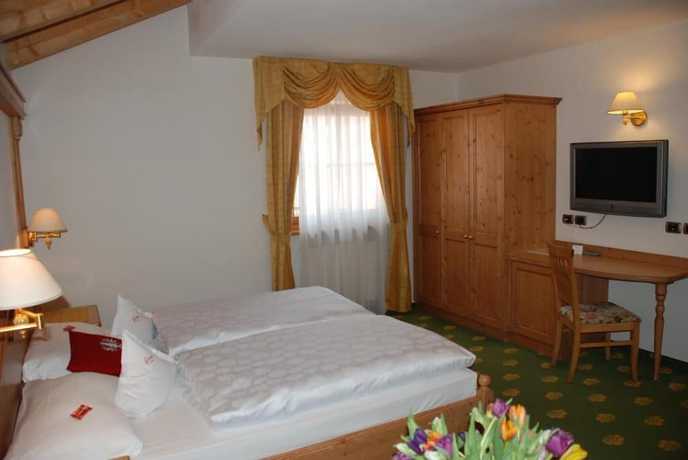 Imagen de la habitación del Hotel Flora, Selva di Val Gardena. Foto 12