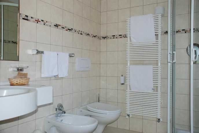 Imagen de la habitación del Hotel Flora, Selva di Val Gardena. Foto 16