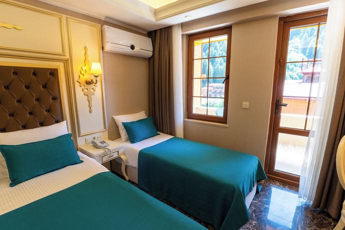 Imagen de la habitación del Hotel Flora Uzungol Resort. Foto 3