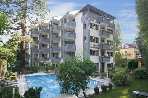 Imagen de la habitación del Hotel Flora & Suites. Foto 2
