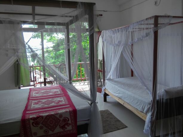 Imagen de la habitación del Hotel Flora and Fauna Mirissa. Foto 11