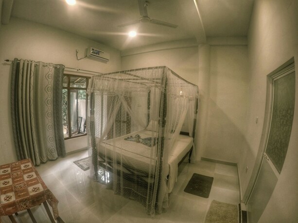 Imagen de la habitación del Hotel Flora and Fauna Mirissa. Foto 16