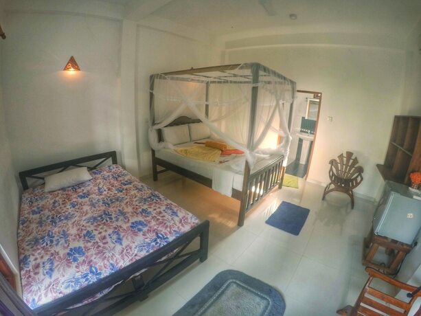 Imagen de la habitación del Hotel Flora and Fauna Mirissa. Foto 17