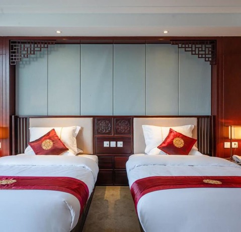 Imagen de la habitación del Hotel Floral Dali Zhonghefang. Foto 3