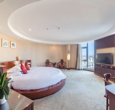 Imagen de la habitación del Hotel Floral Dali Zhonghefang. Foto 11