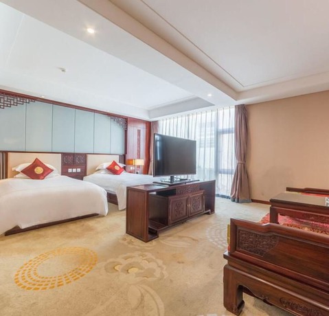 Imagen de la habitación del Hotel Floral Dali Zhonghefang. Foto 12