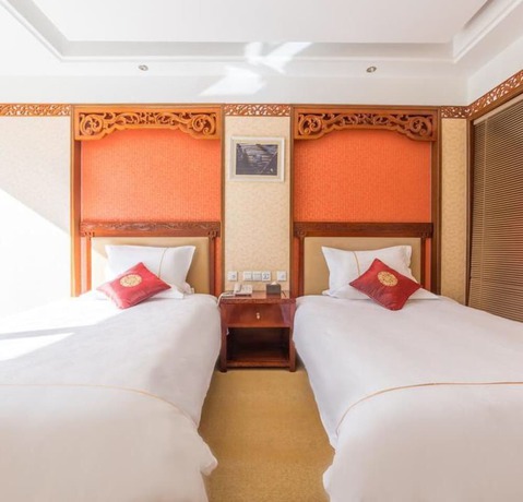 Imagen de la habitación del Hotel Floral Dali Zhonghefang. Foto 15