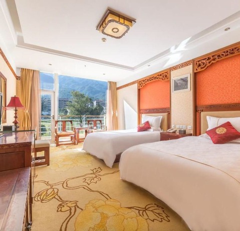 Imagen de la habitación del Hotel Floral Dali Zhonghefang. Foto 16