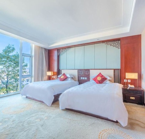 Imagen de la habitación del Hotel Floral Dali Zhonghefang. Foto 19