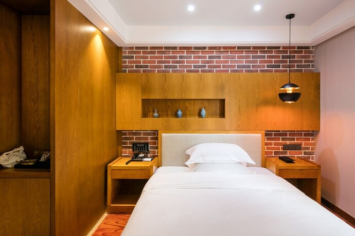 Imagen de la habitación del Hotel Floral Deqing Yingxi Riverside. Foto 16