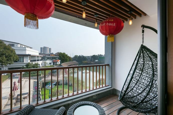 Imagen de la habitación del Hotel Floral Deqing Yingxi Riverside. Foto 21